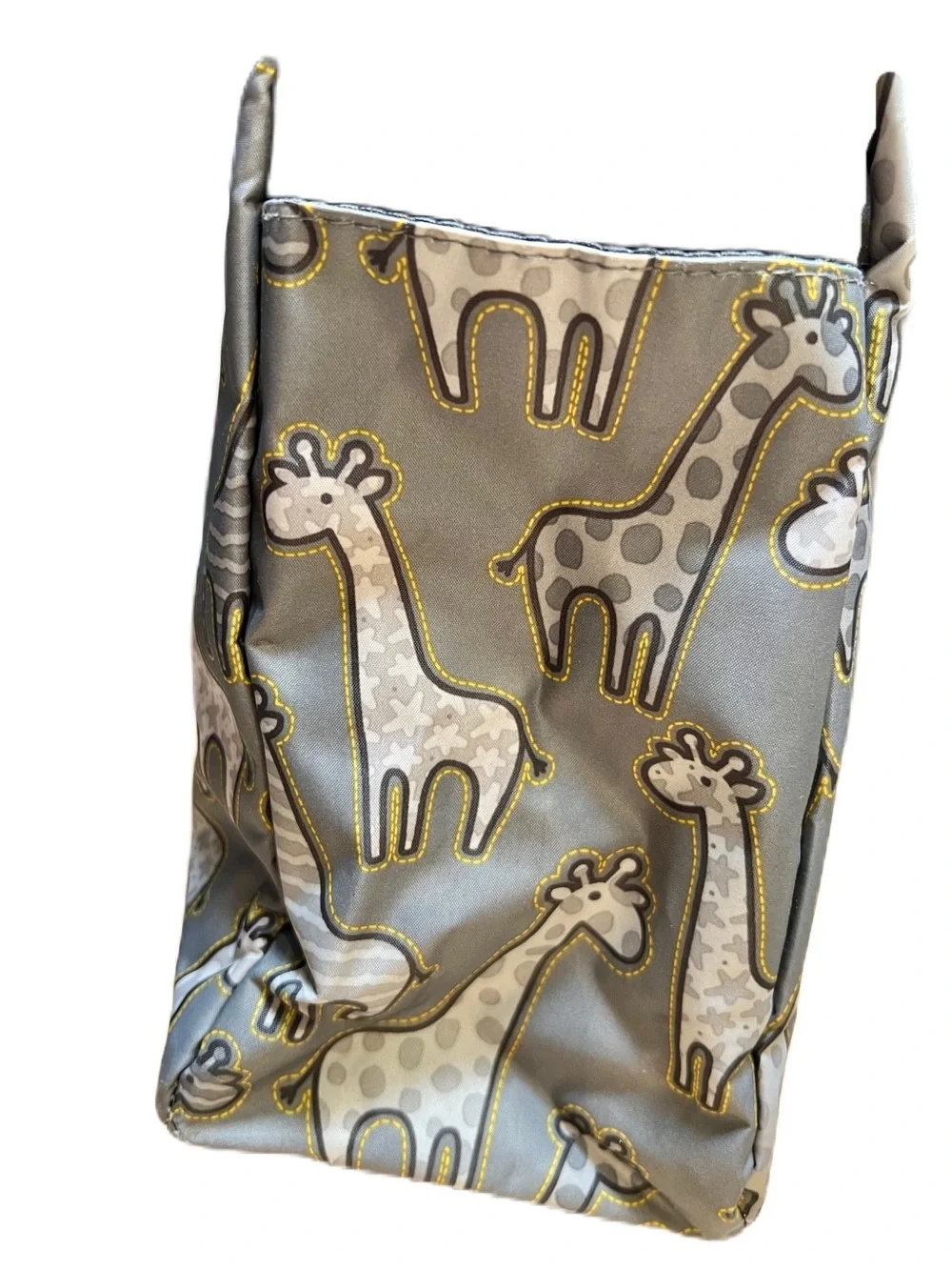 Thirty-One Zip-Top Tote in the Go Go Giraffe print with seven pockets